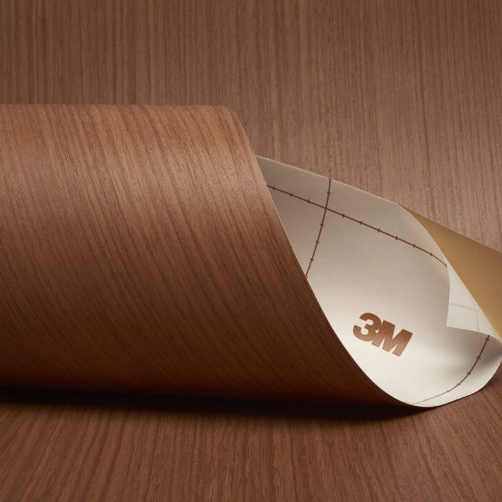 Fine wood veneer film curling to show its backing